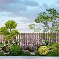 Lush Flowers and Plants in Garden With Wooden Fence Green Shrubs Purple Blooms and Trees