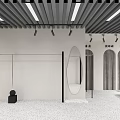 Elegant Modern Clothing Store Interior With Clothing Racks Mirrors And Lighting