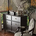 Cozy Dark Wood Dresser With Drawers And Decorative Items By Window Plant And Chair