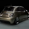 Olive Green Sporty Small Car With Custom Alloy Wheels In Motion