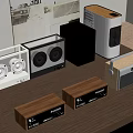 Various Audio Speakers Including Wooden And Modern Designs On Table Top