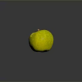 Fresh Yellow Green Apple with Brown Stem on Smooth Dark Surface