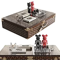 Elegant Patterned Leather Coffee Table With Glass Top Brass Accents And Decorative Figurines