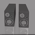 Sleek Modern Black Speakers With Silver Knobs Circular Drivers And Reflections