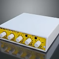 Modern White Electronic Device With Yellow Front Panel And Multiple Control Knobs Design