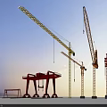 Industrial Construction Equipment Featuring Red Gantry And Yellow Tower Cranes At Outdoor Site
