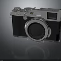 Vintage Film Camera With Silver Body Black Accents And Classic Lens Design