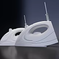 Two White Electric Irons With Sleek Modern Design For Daily Use 3d model