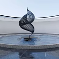 Modern Spiral Metal Sculpture in Circular Water Pool With White Walls and Gray Floor
