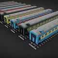Colorful Model Train Cars in Various Colors Parked on Tracks with Windows