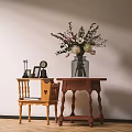 Two Light And Dark Wooden Side Tables With Vase Flowers And Decorative Items
