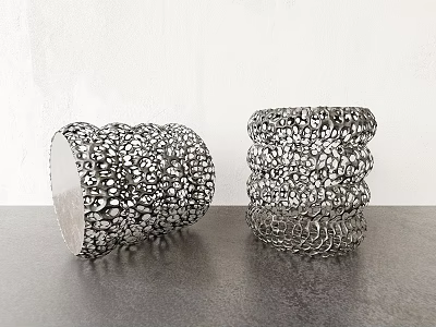 Modern Coffee Table With Gray Tabletop And Metallic Cylindrical Decorations Having Intricate Bead Detailing 3d model