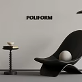 Poliform Minimalist Interior With Black Armchair Side Table And Floor Lamp