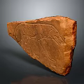 Ancient Carved Animal Figure On Brown Stone Artifact With Intricate Engravings