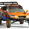 Subaru Orange And Black Rally Car With Large Off Road Tires And Aggressive Styling