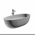 Freestanding White Bathtub with Metal Faucet in Modern Bathroom Setting