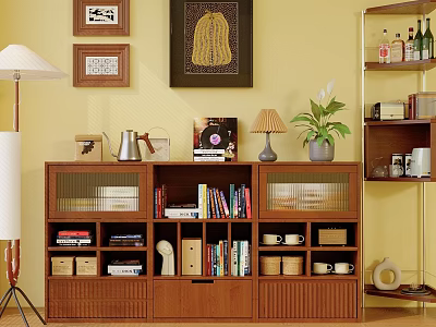 Wooden Bookcase Featuring Storage Compartments Books Decorative Items And Framed Art On Yellow Wall 3d model