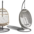Rattan Hanging Chair with Wicker Design White Cushions for Outdoor Use and Sky Background