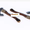 Two Traditional Axes as Weapons with Metal Blades Wooden Handles and Braided Details