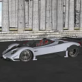 Gray Convertible Sports Car With Red Seats And Black Wheels Against Ancient Stone Columns