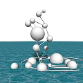 Shiny Silver Sphere Landscape Sculpture Connected by Metal Rods on Rippling Water