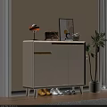 Stylish White Shoe Cabinet with Yellow Trim and Decorative Items Near Potted Plant