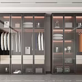 Sleek Modern Wardrobe Interior With Glass Doors Hanging Rails Folded Clothes And Storage Spaces