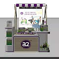 A2 Milk Product Display Kiosk With Purple Striped Awning And Green Packages