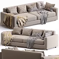 Comfortable Beige Multi Seater Sofa With Plaid Striped Blankets And Decorative Pillows