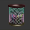 Silver Metal Mesh Pen Holder With Green Pencils On Desk