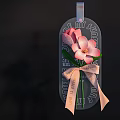 Hanging Glass Tag Vase Flowers with Pink Purple Blooms and Decorative Pink Bows