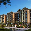Elegant Multi story Residential Building With Landscaped Gardens Walking Paths And Pond