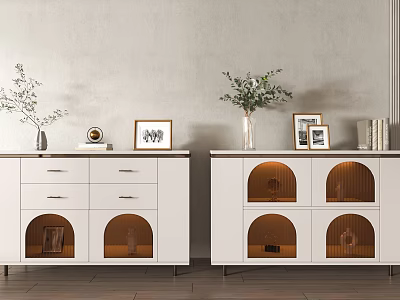 Modern White Sideboard With Drawers And Arched Doors Decorated With Vases Photo Frames And Books 3d model