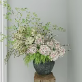 Pink And White Hydrangea Flowers In Black Marble Vase On Wooden Stand With Green Leaves