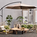 Outdoor Wicker Chairs And Round Wooden Table Set With Umbrella Green Plants And Chinese Scrolls
