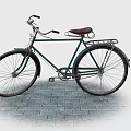 Vintage Green Bicycle With Steel Frame Brown Leather Seat On Brick Pavement