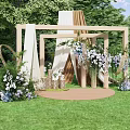Outdoor Floral Installation With Wooden Frames Hanging White Purple Flowers And Green Grass