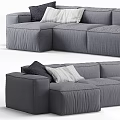 Modern Gray Sectional Sofa With Plush Cushions And Cozy Throw Blanket Design