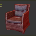 Modern Woven Rattan Chair Featuring Blue Cushion And Brown Comfortable Seat