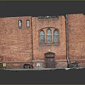Vintage Red Brick Building With Arched Windows Wooden Door And Weathered Roof