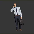 Businessman Talking on Phone in Light Blue Shirt Holding Gray Briefcase Against Gray Background