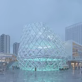 Modern Geometric Glass Office Building With Transparent Illuminated Facade And Urban Pedestrians