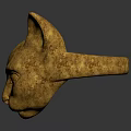 Golden Egyptian Style Cat Head Sculpture With Textured Surface And Dark Background Reflection