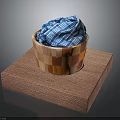 Home Decorative Woven Storage Basket With Blue Checkered Cloth On Brown Mat