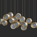 Golden Irregular Circular Pendant Lights with Transparent Shades Hanging in Modern Interior