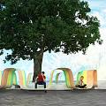 Colorful Wavy Outdoor Chair Design for Leisure Area Under Big Tree with Stone Pavement