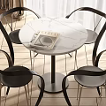 Modern Round Dining Table Set With White Marble Top And Four Black Metal Leg Chairs