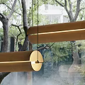 Modern Cylindrical Pendant Light With Glowing Strip Against Natural Tree Background Space