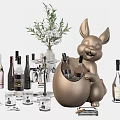 Wine Bottles and Wine Glasses Styled Display with Rabbit Sculpture Vase and Greenery