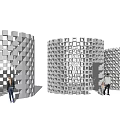 Fitness Enthusiasts Doing Workouts Around Gray Cube Cylinder Structures With Openings